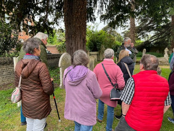 Howard Slatter talking in the churchyard, Local History Group walk, 1 June 2023. Photo: Janelle Robbins.