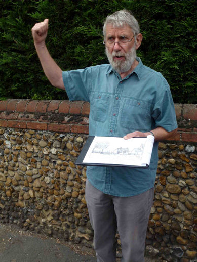 Howard Slatter with the Widnall drawing of the blacksmith’s, Local History Group walk. Photo: Martin Jones, 1 July 2012.