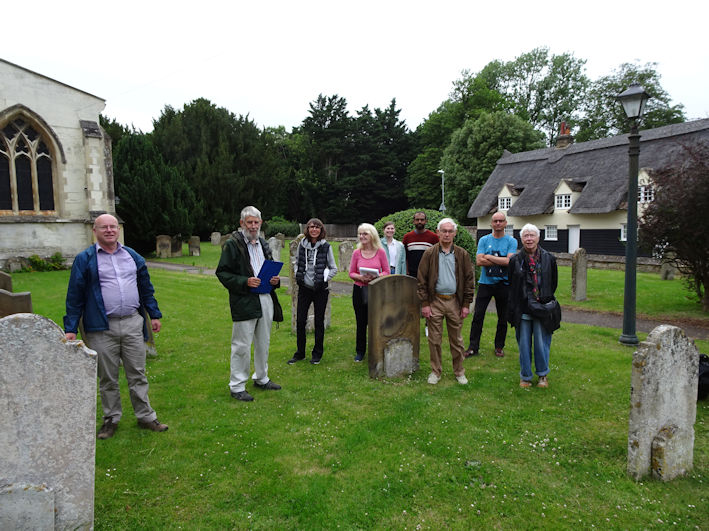 Local History Group village walk, in the churchyard. Photo: Andrew Roberts, 24 June 2021.