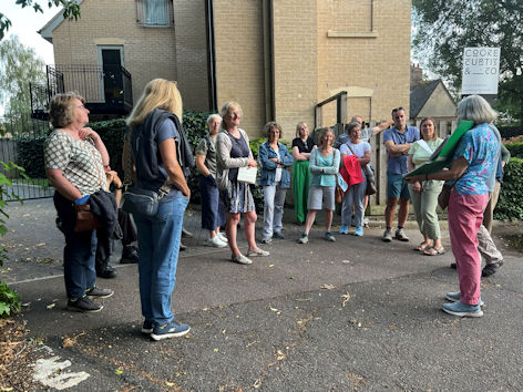 At the site of the Villa petrol station, High Street, Local History Group walk, 29 June 2023. Photo: Janelle Robbins.
