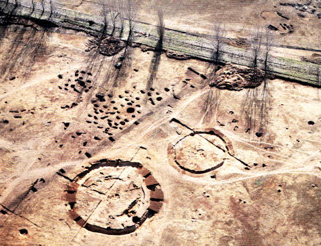 Aerial photograph of the Trumpington Meadows excavation, with Neolithic/Bronze Age monuments and Iron Age pits and the route of the former railway line. Paul Bailey for the Cambridge Archaeological Unit. In Riversides, page 37, Figure 2.4.