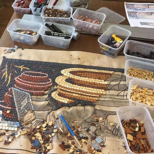 Repair of the damage to the bed burial mosaic. Photo: Gary Drostle, 2017.
