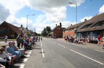 The High Street and Village Hall prior to the race. Photo: via Anna Bird, 7 July 2014.
