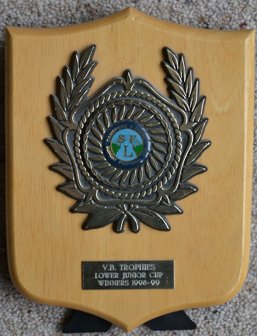 VB Trophies Lower Junior Cup, plaque awarded to Trumpington Tornadoes players, Winners 1998-99. Source: Barry Thompson. Photo: Wendy Roberts, 16 March 2023.
