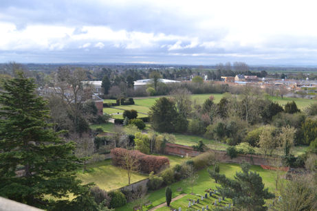 Looking from Trumpington church tower over the churchyard and vicarage garden to the south east over Anstey Hall and its grounds, to Waitrose, with the first new homes on the Trumpington Meadows development to the right, towards Great Shelford. Photo: Andrew Roberts, 7 April 2012.