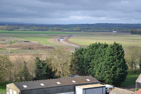 Looking from Trumpington church tower south west over the outbuildings of Anstey Hall Farm, with Trumpington Meadows park, towards Haslingfield. Photo: Andrew Roberts, 7 April 2012.