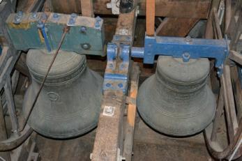 Two of the bells in the bell loft, Trumpington church. Photo: Andrew Roberts, April 2012.