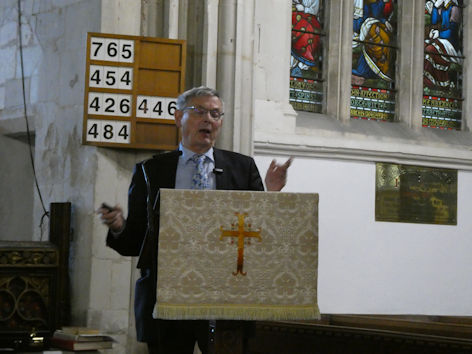 Edmund Brookes speaking at the Local History Group meeting in Trumpington Church. Photo: Andrew Roberts, 7 May 2026.