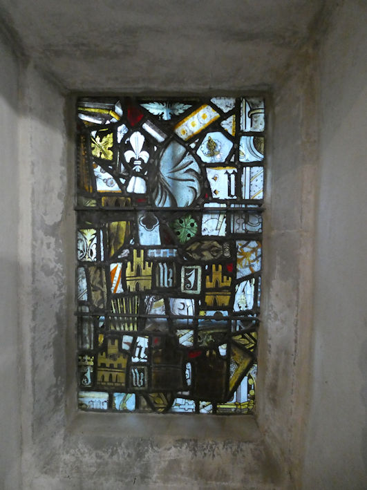 Medieval glass formed into a window in the chancel, Trumpington Church. Photo: Andrew Roberts, 7 May 2026.