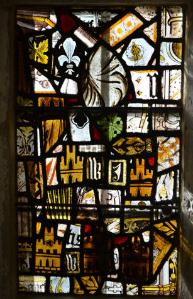 Medieval glass in a window on the south side of the Chancel. Photo: Andrew Roberts, October 2011.