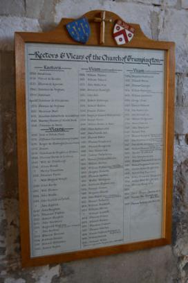 Plaque listing rectors and vicars on the west wall of the North Aisle, Trumpington Church. Photo: Andrew Roberts, 18 October 2011.