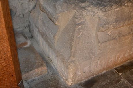 The stone base of the former village cross, Stockton Cross, under the Tower, Trumpington Church. Photo: Andrew Roberts, 18 October 2011.