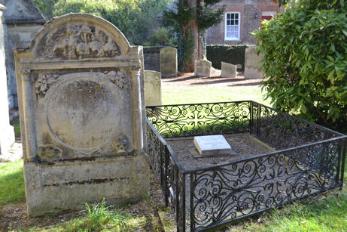 Headstone to William Stacey, d. 1729, and family, and memorial to Henry Fawcett, close to the south wall of the Chancel, Trumpington Church. Photo: Andrew Roberts, October 2011.