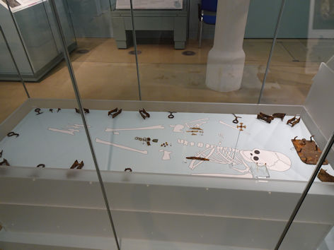 Reconstruction of the bed burial in the exhibition at the Museum of Archaeology and Anthropology. Photo: Andrew Roberts, 29 June 2023.