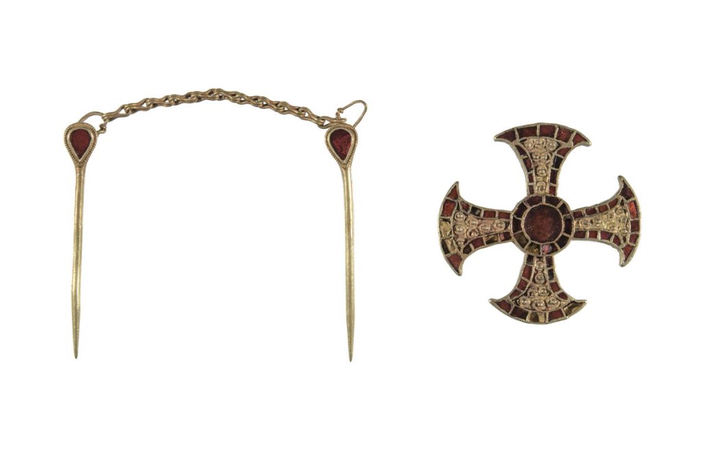 The Trumpington Cross and chain. Photograph from Museum of Archaeology and Anthropology accession record (https://collections.maa.cam.ac.uk/objects/567097/).