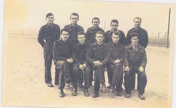 Group of Italian prisoners, understood to be in Trumpington Camp, including Vittorio Prati (second from right in the front row). Source: Cristina Prati, December 2013.
