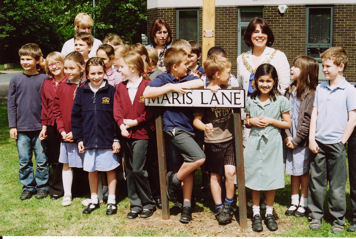 Teachers and children from Fawcett Junior School and the Mayor of Cambridge, Councillor Sheila Stuart, at the unveiling of the new Trumpington Village Sign. Photo: Andrew Roberts, 15 June 2010.