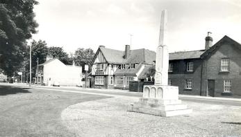 Trumpington War Memorial and the Red Lion, 1969. Cambridgeshire Collection. Frith Collection, TM.30.