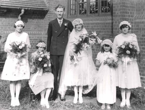 Wedding photograph with Olive May Stearn and Eric Gordon Peters outside the hall, 17 September 1927.