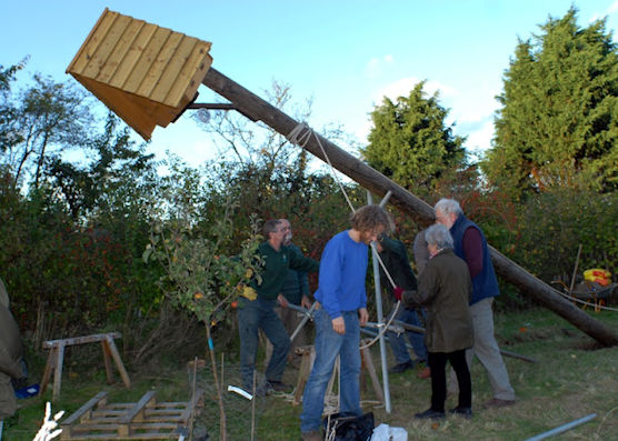 Erecting the Trumpington Community Orchard swift tower. Source swift-conservation.org.